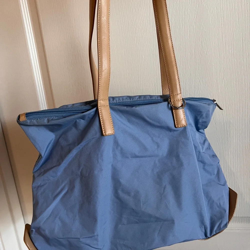 Tumi light blue
